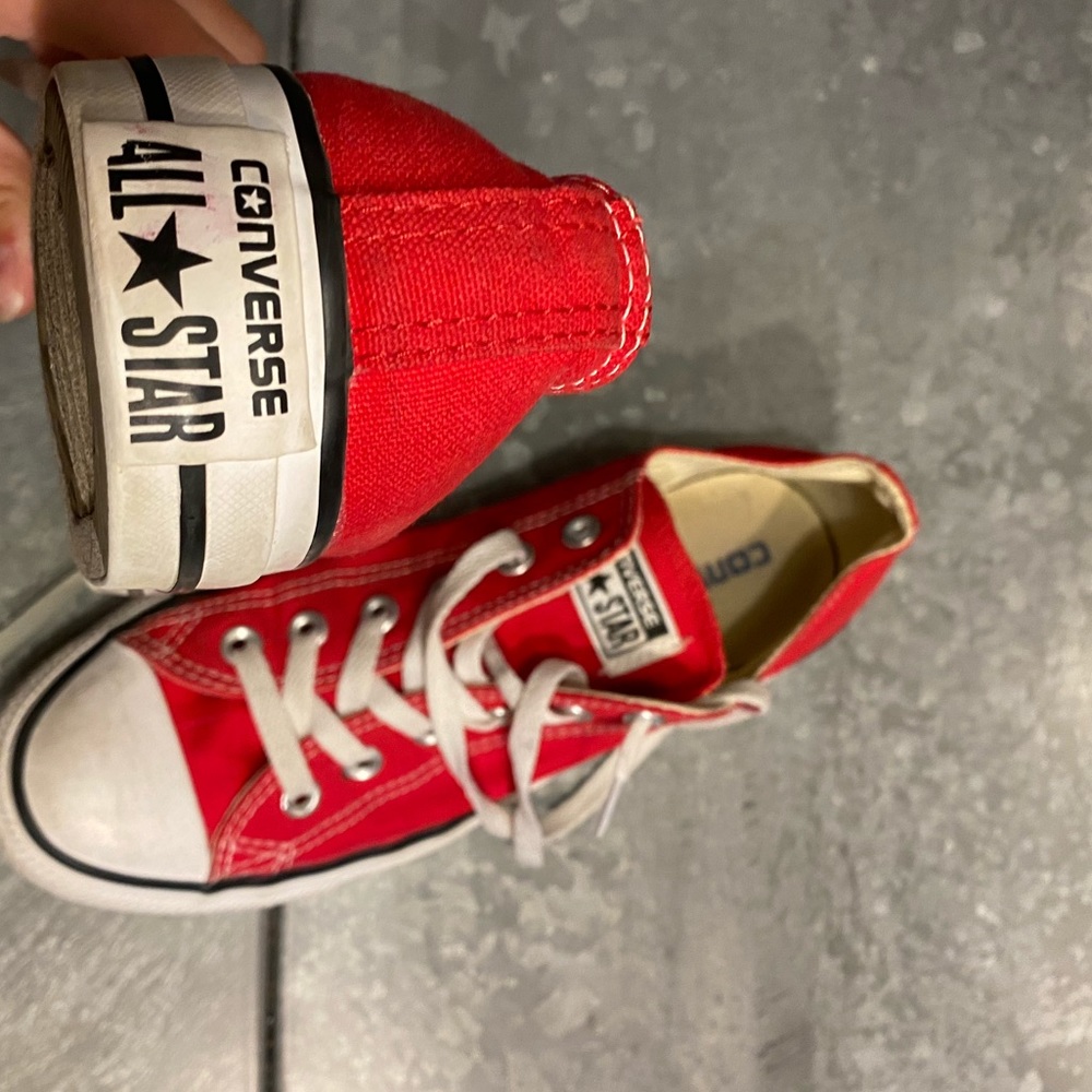 Women’s red low top converse